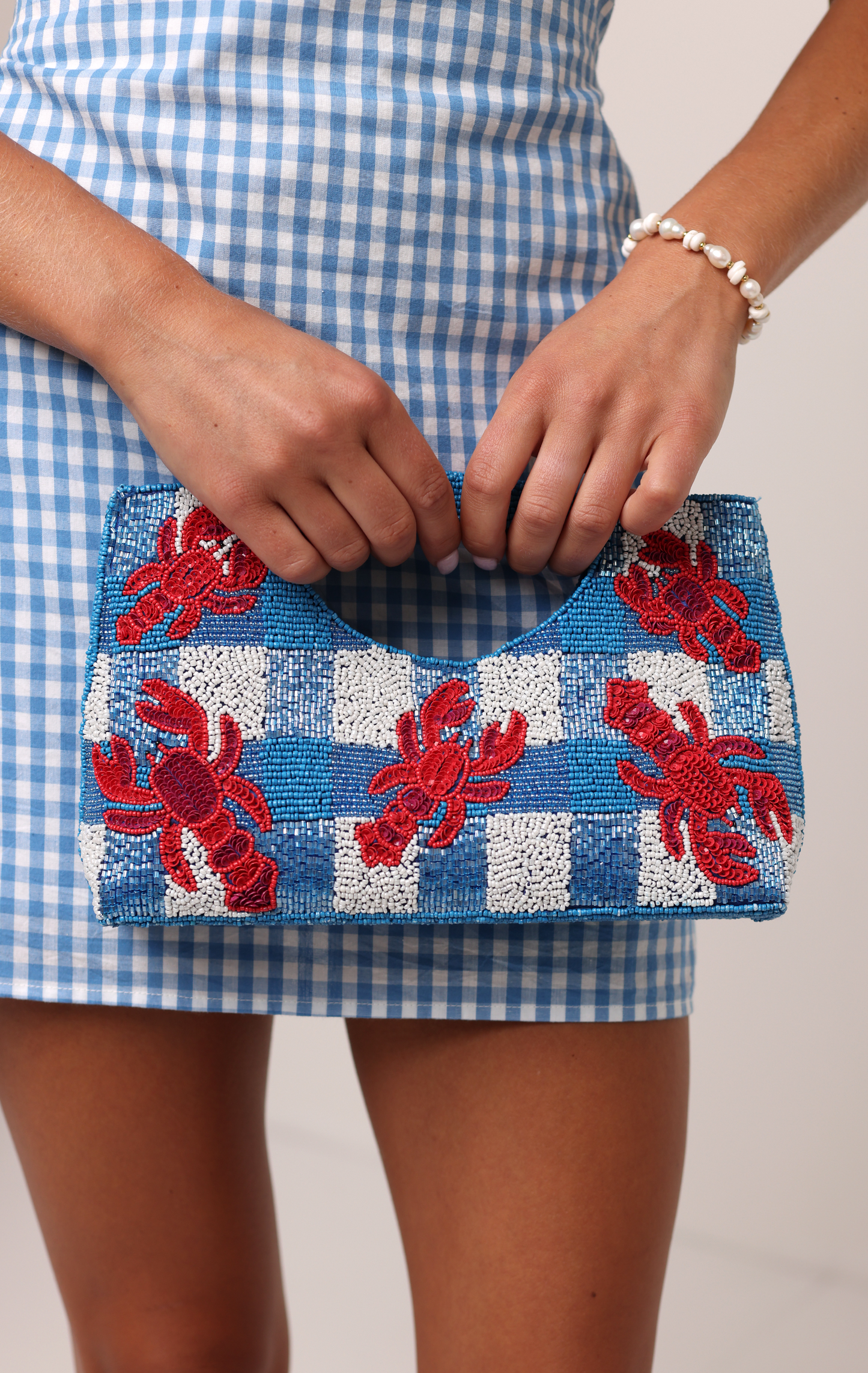 COASTAL CLAW BEADED CLUTCH